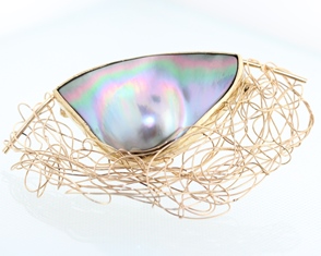 Pearl and gold wire brooch