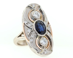 Yellow and white gold sapphire and diamond ring