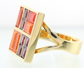 Fire opal and garnet ring