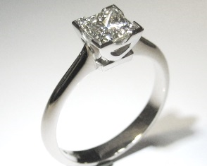 Single stone princess cut diamond ring