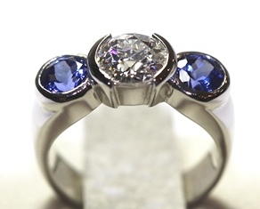 Diamond and tanzanite three stone ring