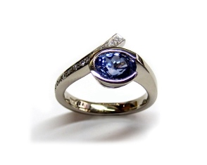 Sapphire and diamond crossover ring